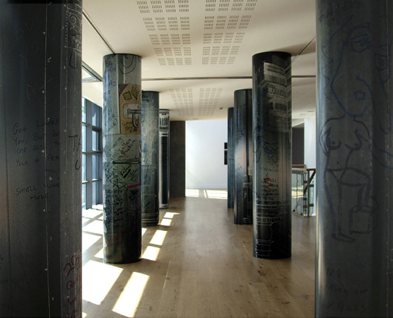 'Pillars' installation view, View of eight 268 x 50cm-wide Lambdachrome prints attached to 'Round-a-Form' pillars